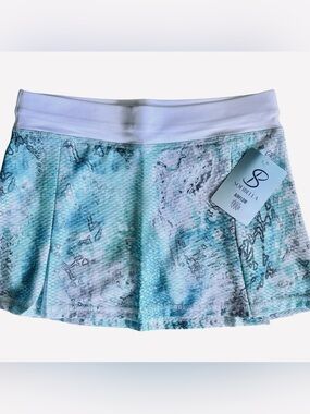 Women's Sofibella skort activewear in a beautiful combination of colors.